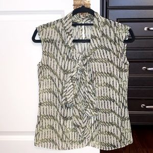Sheer green and white sleeveless dress shirt with neck tie.